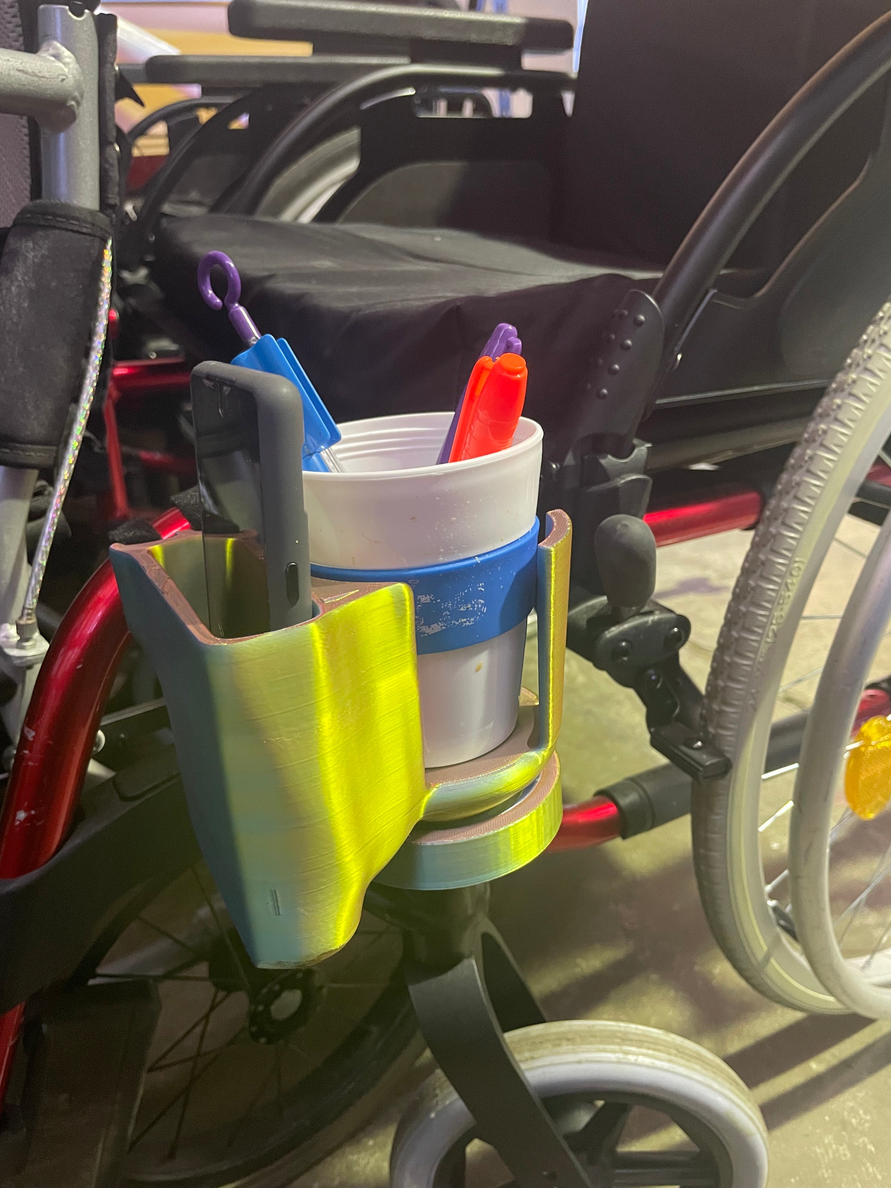 Cup/Phone holder for wheelchair users