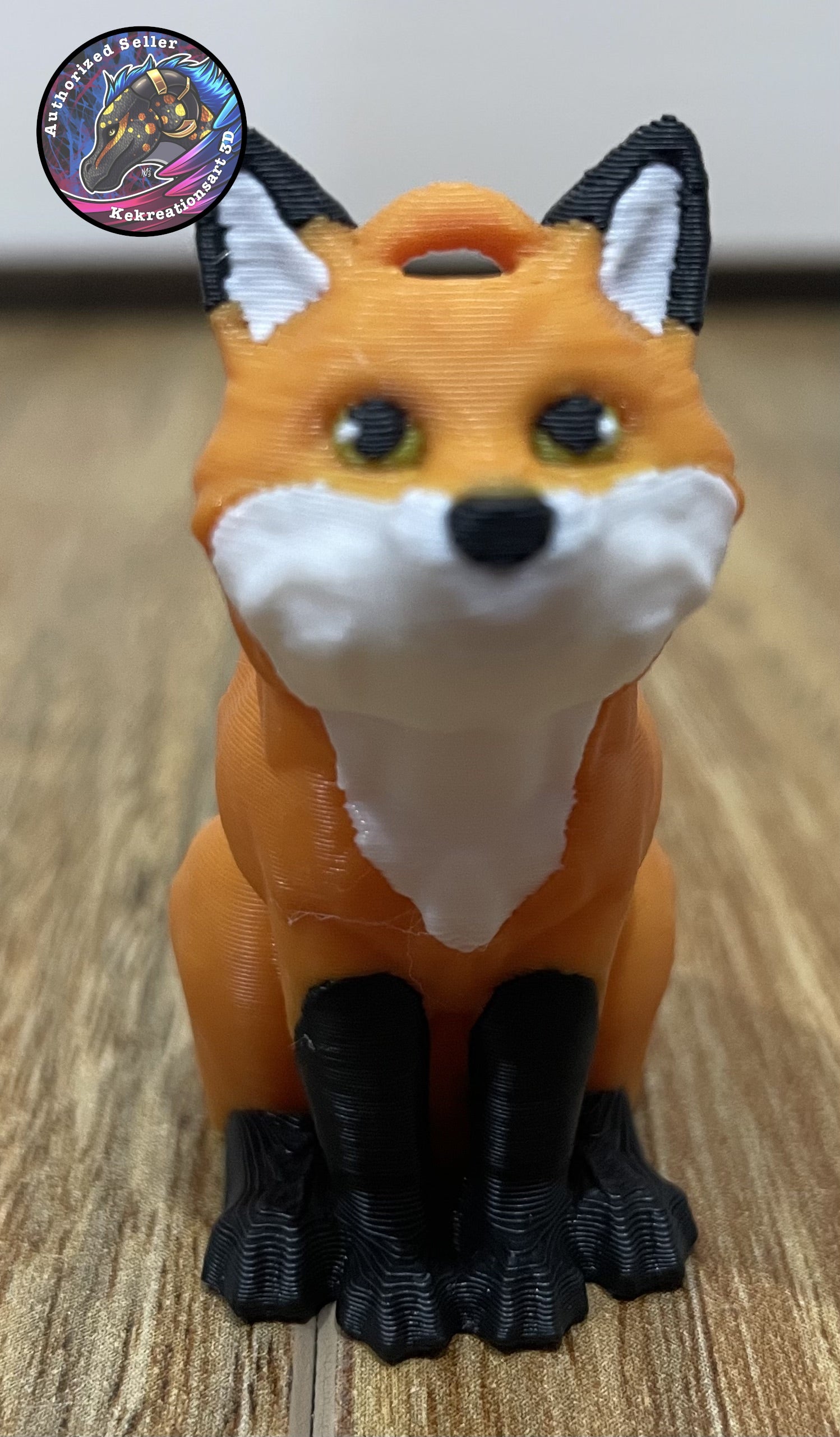 3D-printed fox figurine on a wooden surface